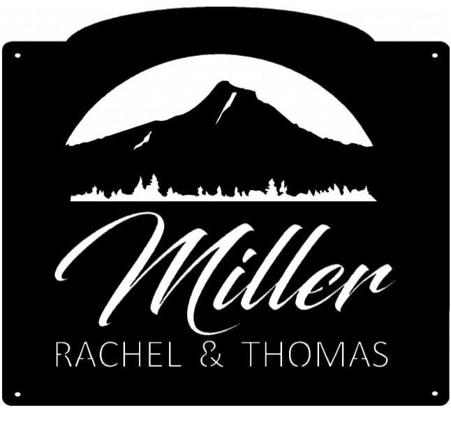 Metal mountain evergreen sign with evergreen mountain silhouette